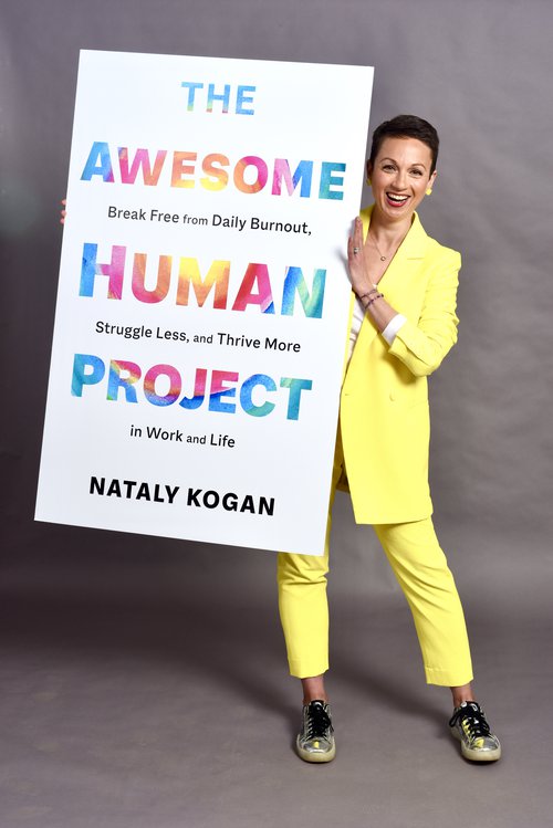 Nataly holding giant book cover